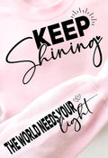 KEEP SHINING THE WORLD NEEDS YOUR LIGHT WITH SLEEVE