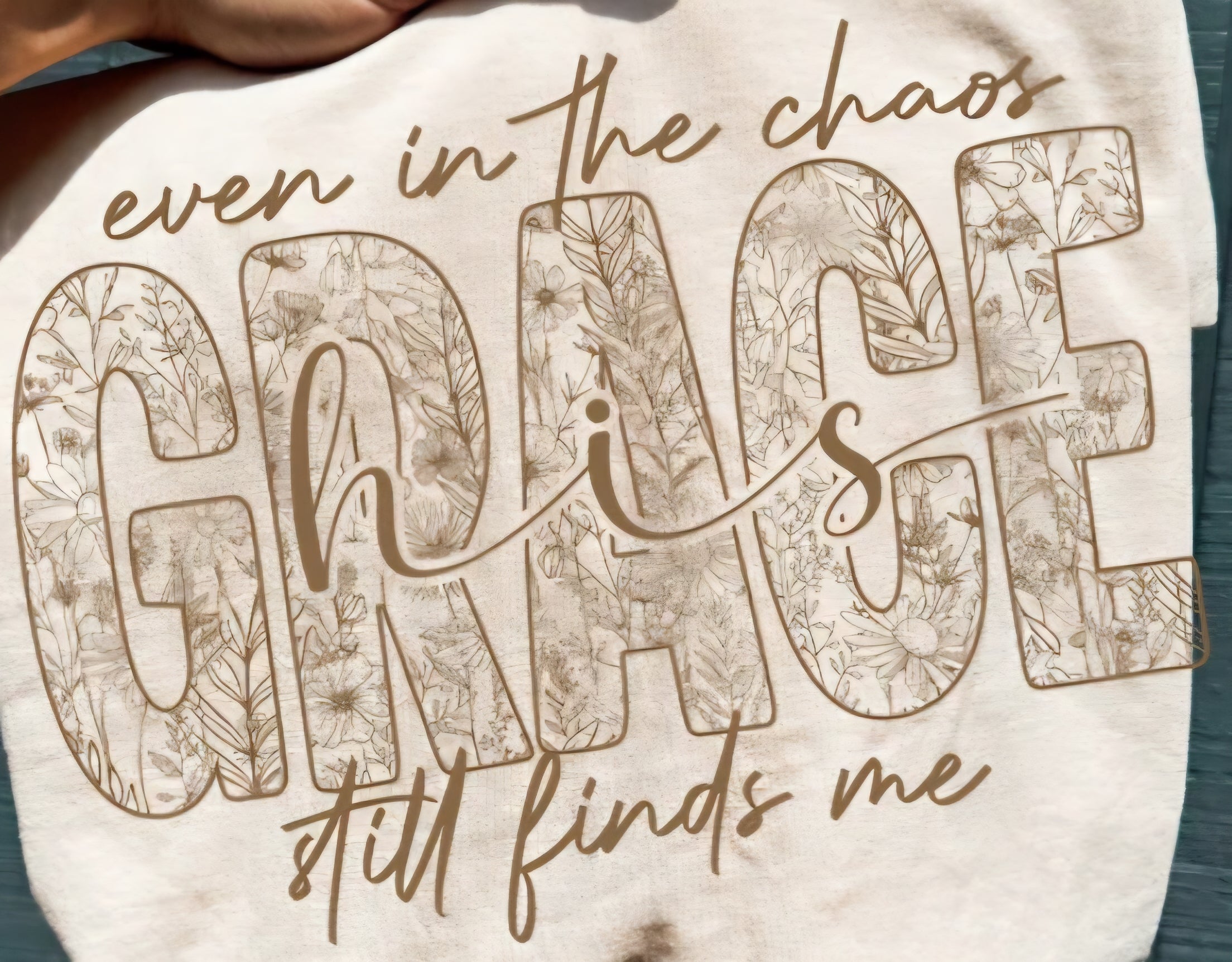 EVEN IN THE CHAOS HIS GRACE STILL FINDS ME