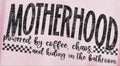 MOTHERHOOD POWERED BY COFFEE, CHAOS, AND HIDING IN THE BATHROOM